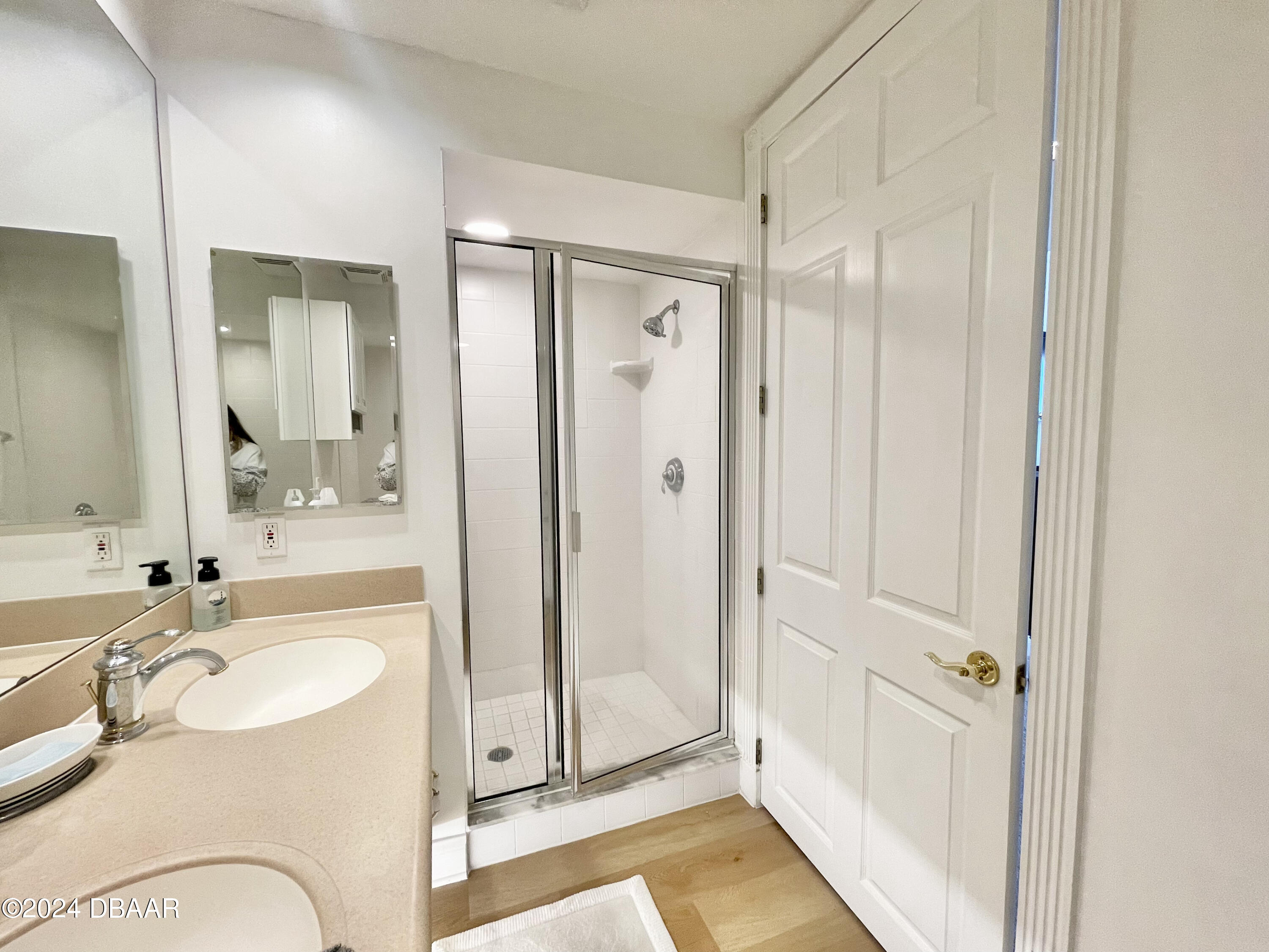 4626 Harbour Village Boulevard, Unit 3505 Ponce Inlet, FL 32127 - Photo 19 of 38 a bathroom with a sink and a mirror