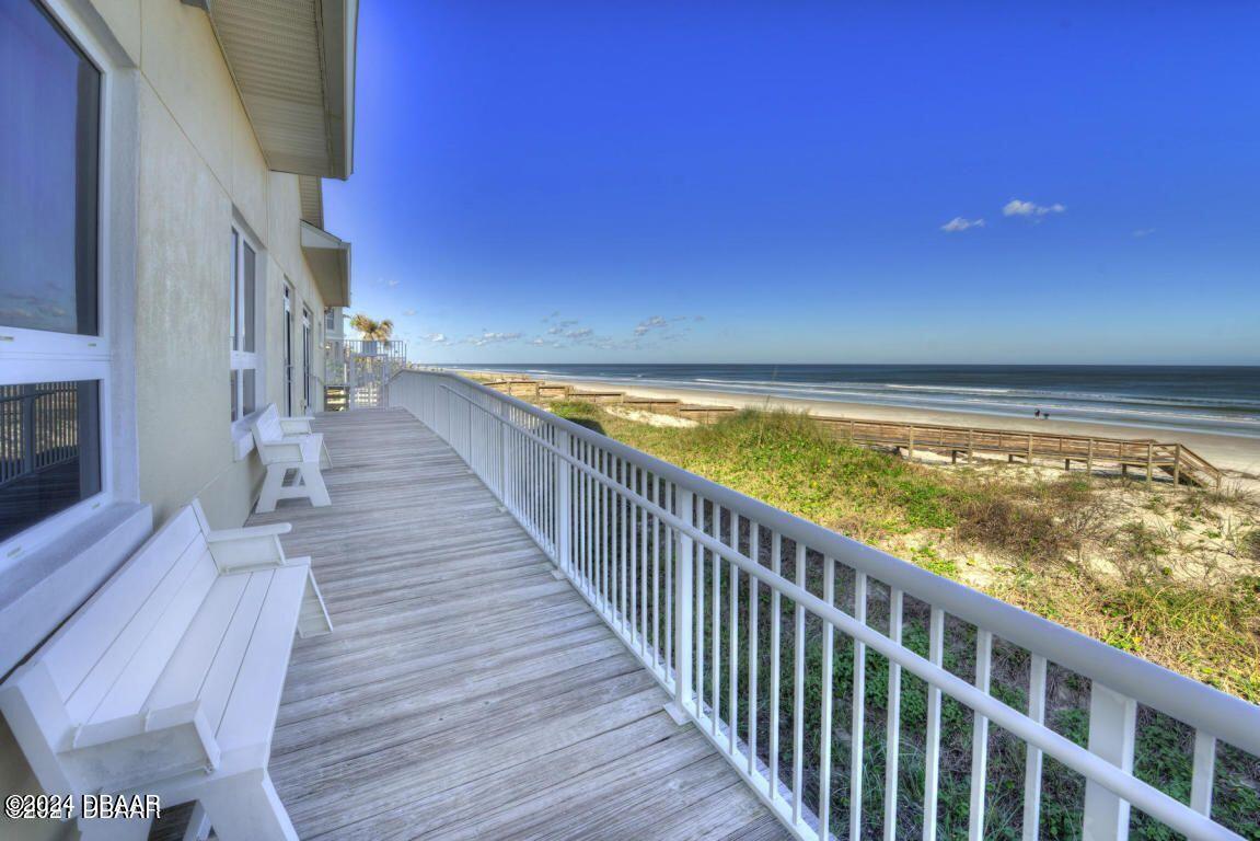 4626 Harbour Village Boulevard, Unit 3505 Ponce Inlet, FL 32127 - Photo 24 of 38 a view of balcony with wooden floor