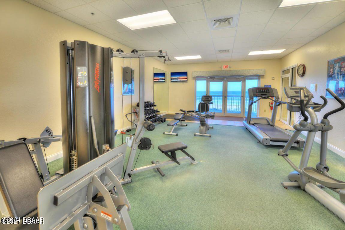 4626 Harbour Village Boulevard, Unit 3505 Ponce Inlet, FL 32127 - Photo 28 of 38 a view of a room with gym equipment