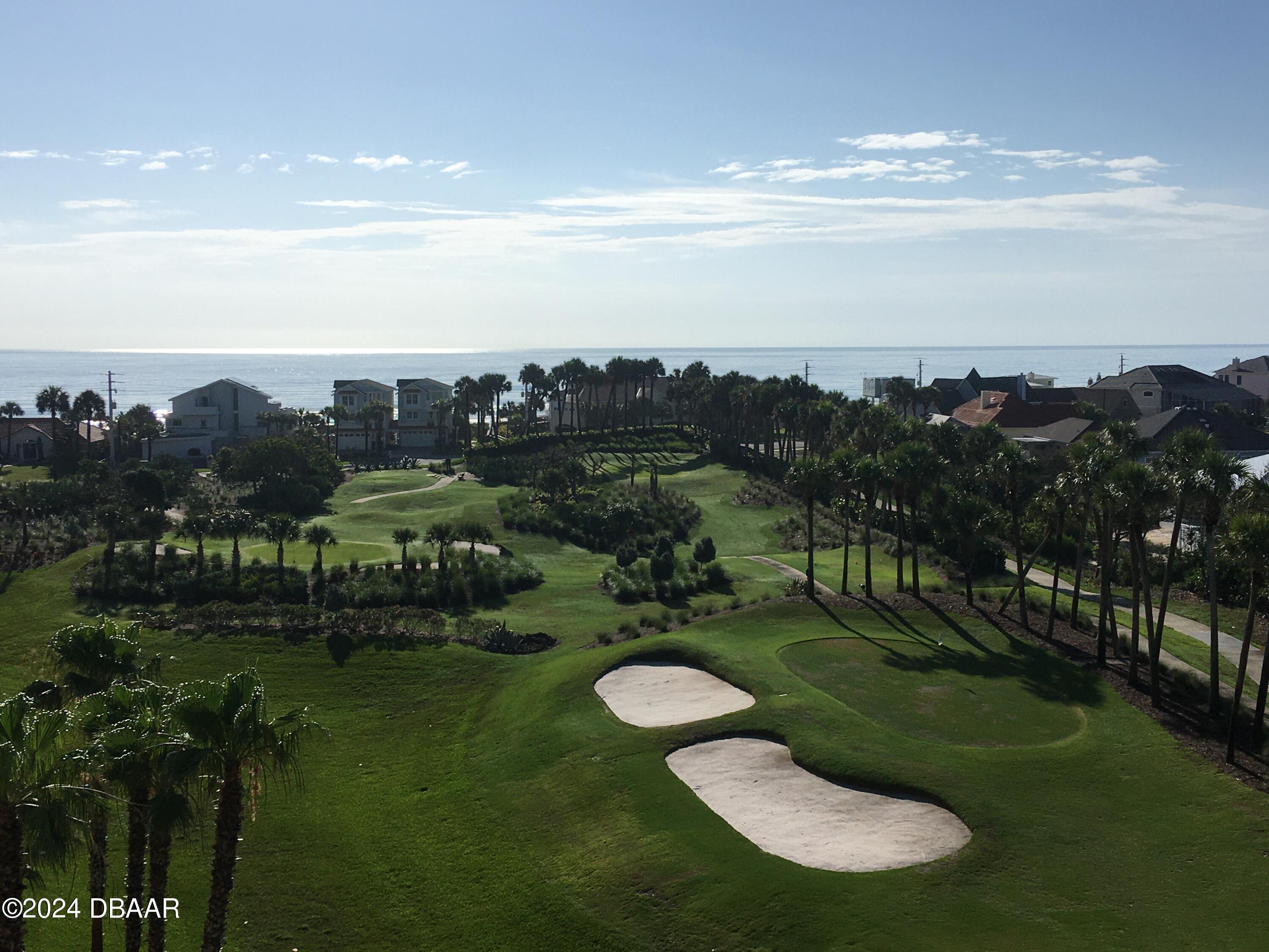 4626 Harbour Village Boulevard, Unit 3505 Ponce Inlet, FL 32127 - Photo 30 of 38 a view of a golf course with outside space
