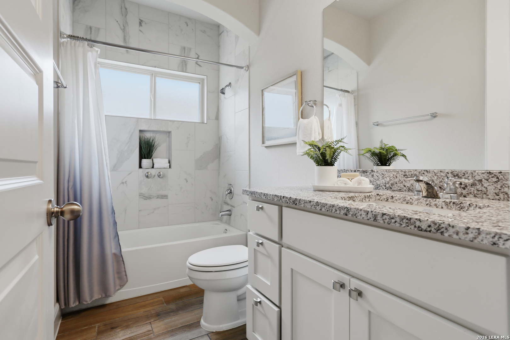 337 Misty Sails Cibolo, TX 78108 - Photo 31 of 50 a bathroom with a granite countertop sink toilet and shower