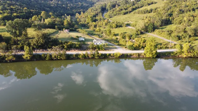 a view of a city and mountains ocean view