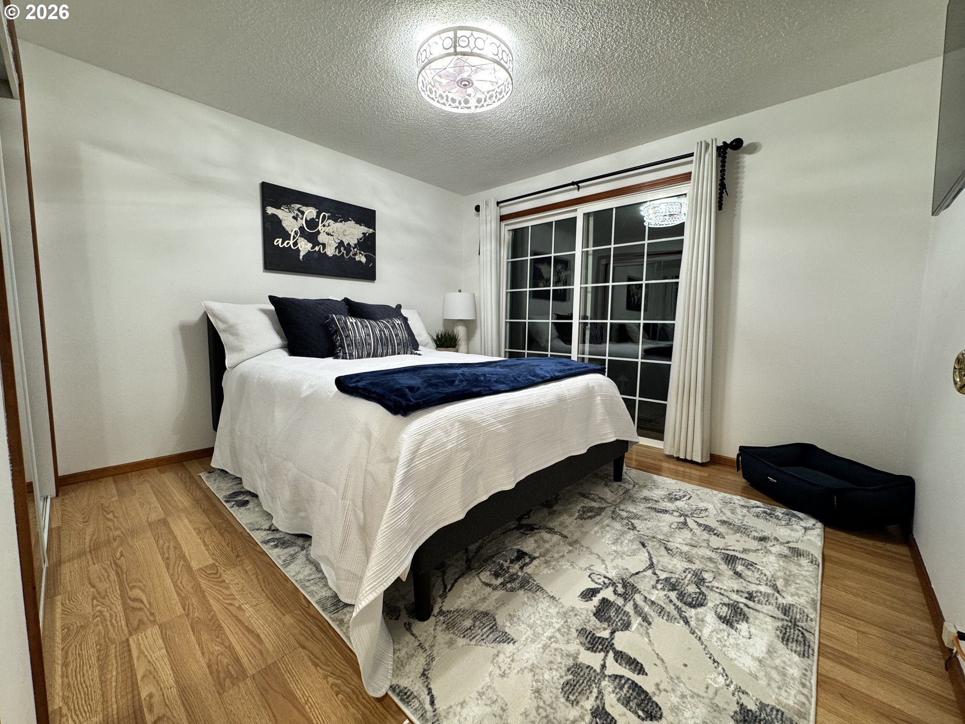 1091 Longridge Drive Springfield, OR 97478 - Photo 11 of 21 a bedroom with a bed and a window