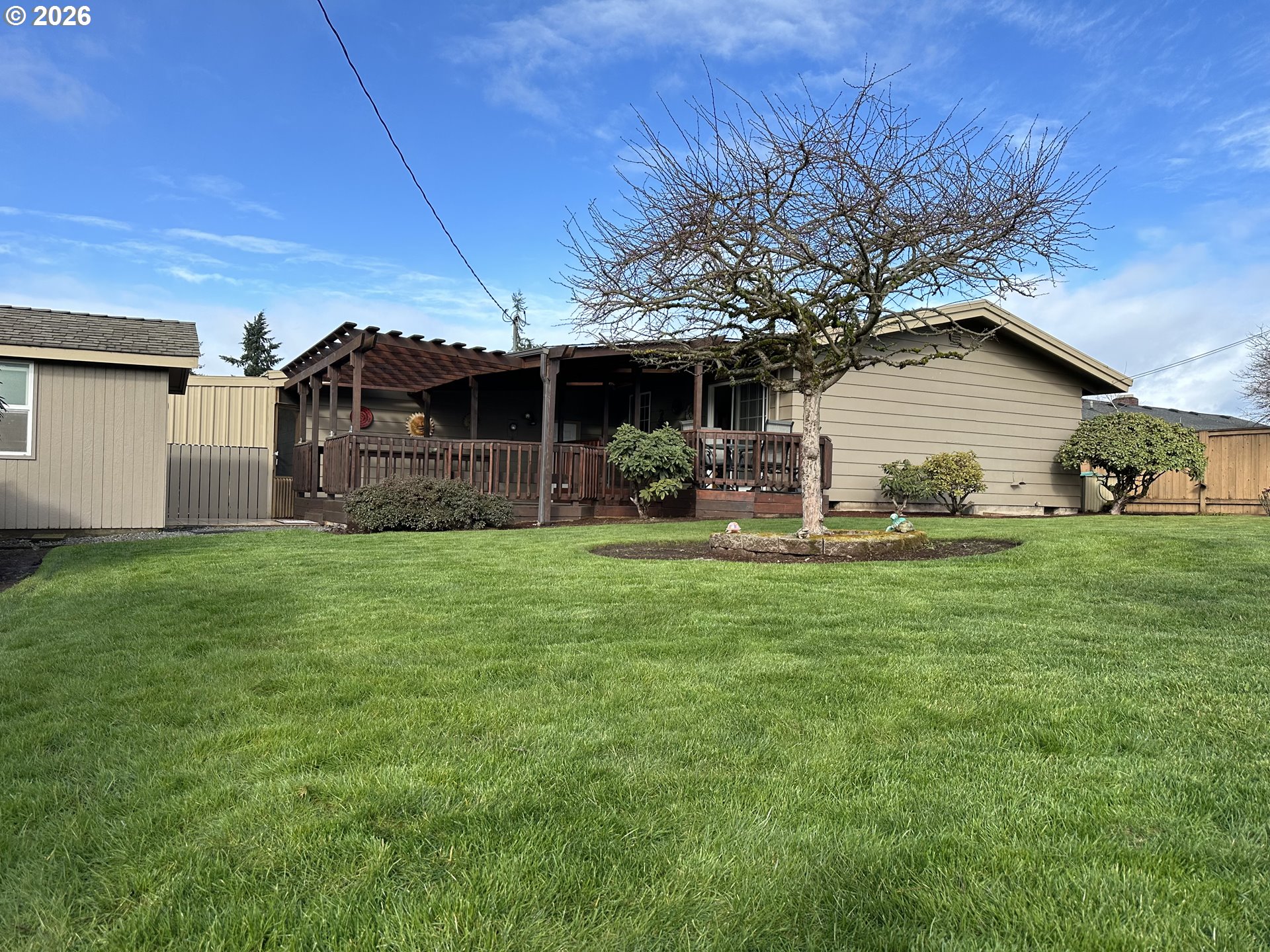 1091 Longridge Drive Springfield, OR 97478 - Photo 20 of 21 a front view of house with yard and green space
