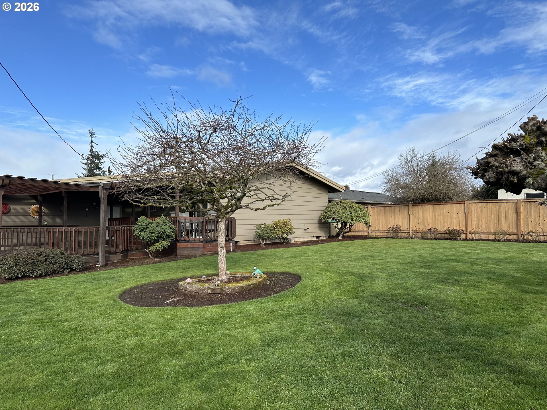 1091 Longridge Drive Springfield, OR 97478 - Photo 21 of 21 a backyard of a house with lots of green space