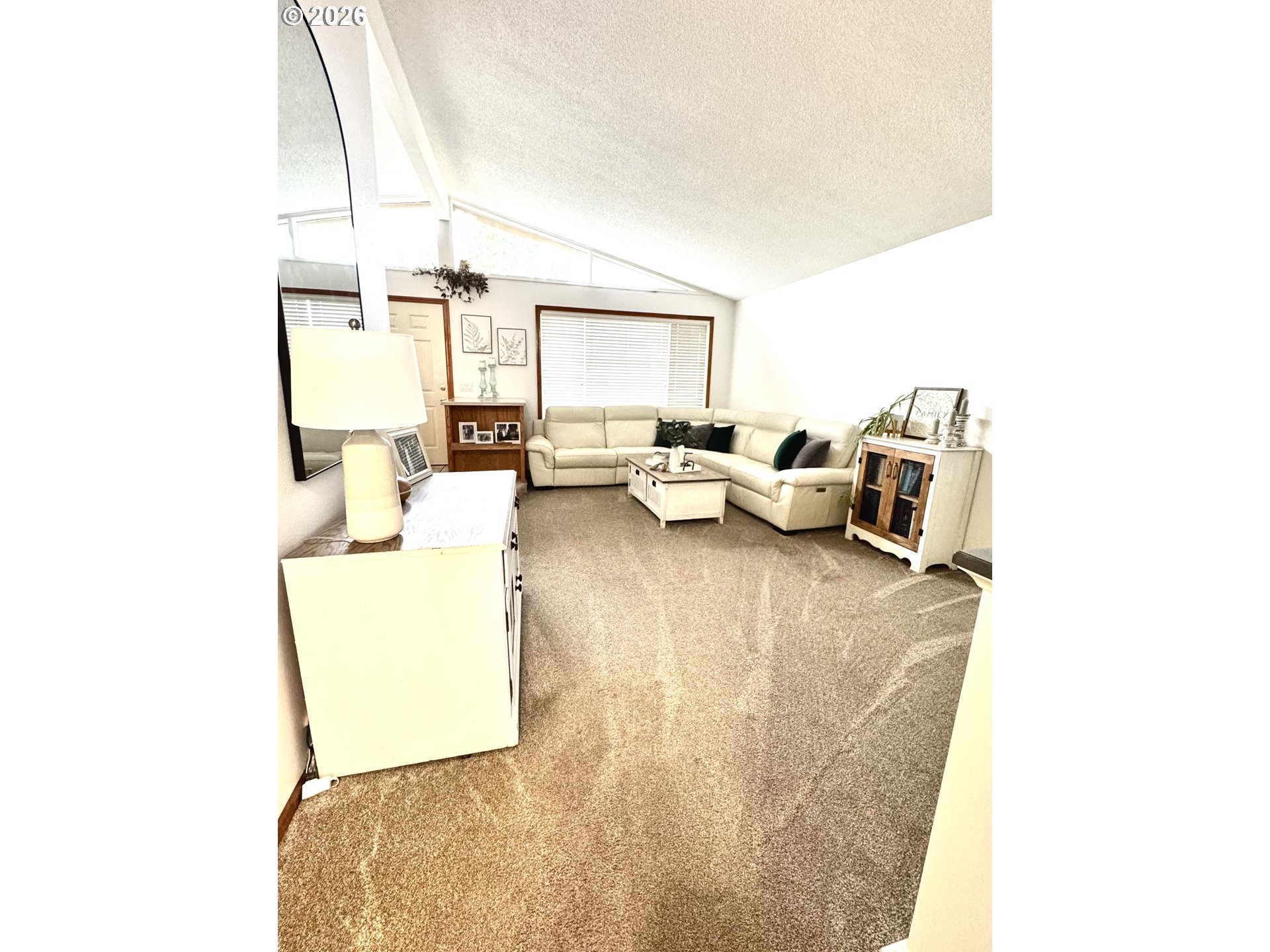 1091 Longridge Drive Springfield, OR 97478 - Photo 3 of 21 a living room with furniture and a table