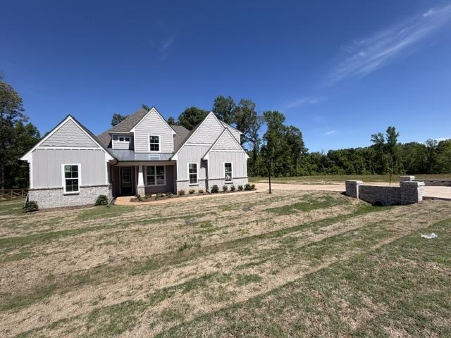 210 Drake Drive Collierville, TN 38017 - Photo 2 of 19 a view of a house with wooden fence