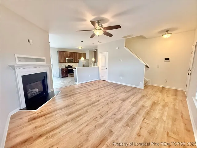a view of a livingroom with a fireplace
