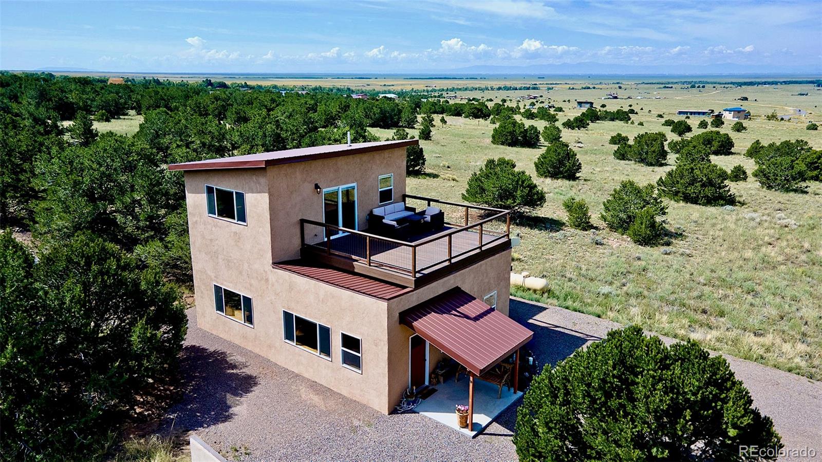 3421 Camino Del Rey Crestone, CO 81131 - Photo 1 of 41 an aerial view of a house with a yard