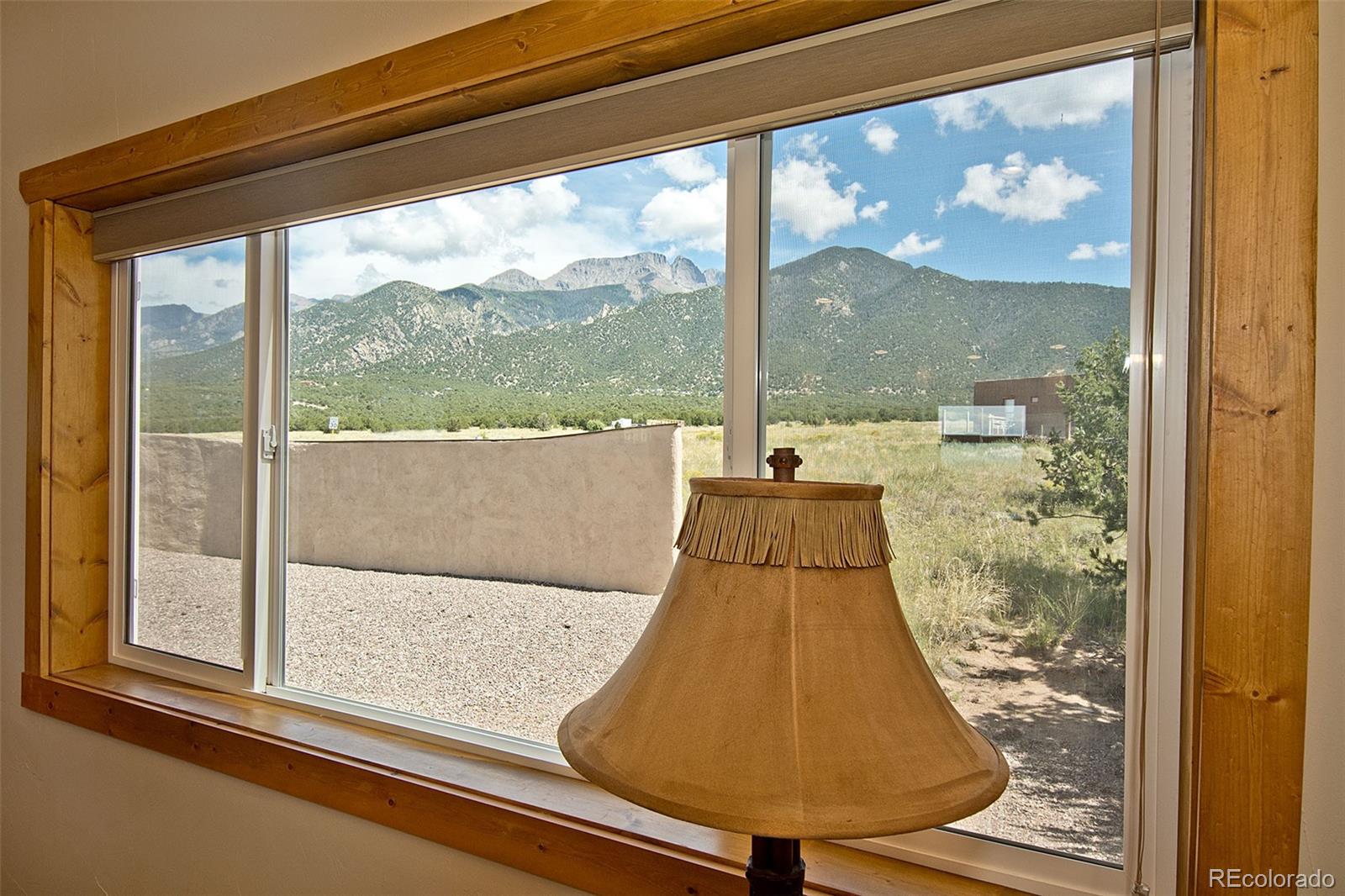 3421 Camino Del Rey Crestone, CO 81131 - Photo 12 of 41 a view of a large window with wooden floor