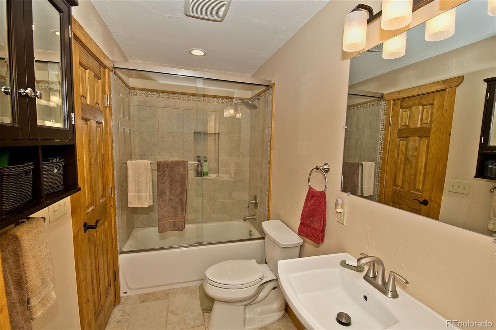 3421 Camino Del Rey Crestone, CO 81131 - Photo 24 of 41 a bathroom with a sink toilet and shower