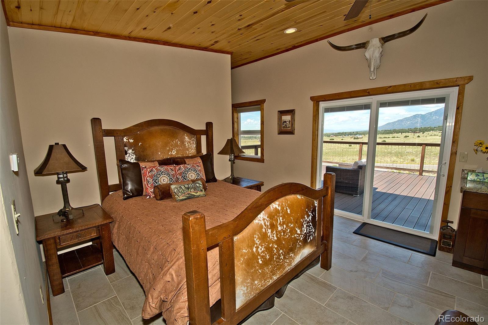3421 Camino Del Rey Crestone, CO 81131 - Photo 31 of 41 a bed room with a bed and a balcony