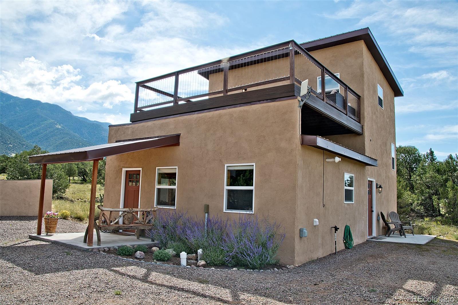 3421 Camino Del Rey Crestone, CO 81131 - Photo 5 of 41 a view of a house with a street