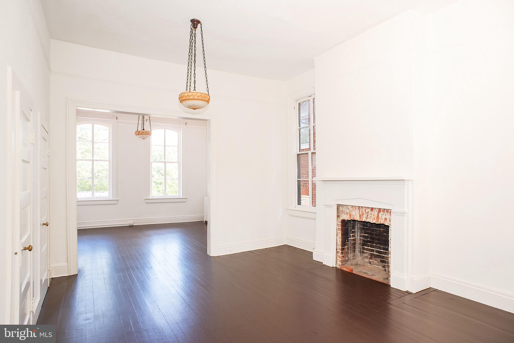 219 Hanover Street, Unit 4 Annapolis, MD 21401 - Photo 6 of 13 High ceilings, decorative fireplace, wood floors