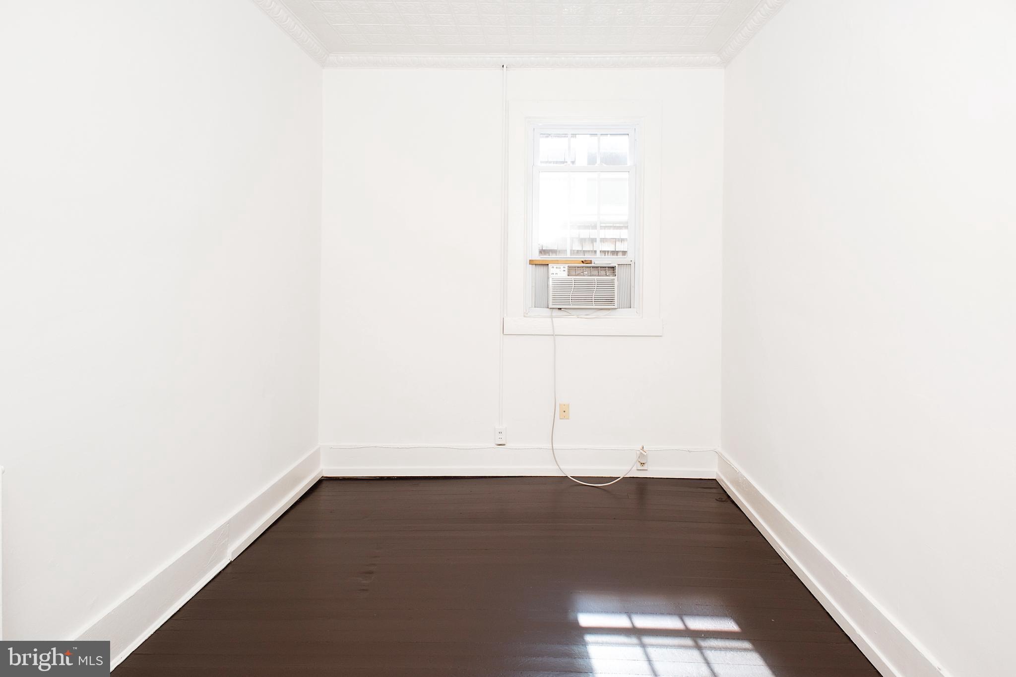 219 Hanover Street, Unit 4 Annapolis, MD 21401 - Photo 10 of 13 Bedroom with window A/C
