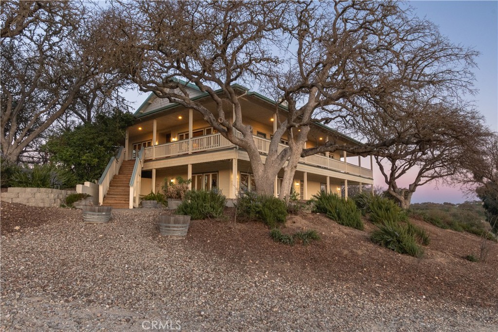 390 San Marcos Road Paso Robles, CA 93446 - Photo 21 of 62 a front view of a house with a garden
