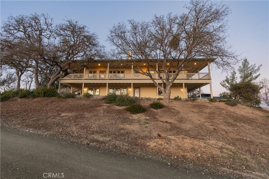 390 San Marcos Road Paso Robles, CA 93446 - Photo 3 of 62 a front view of a house with a yard