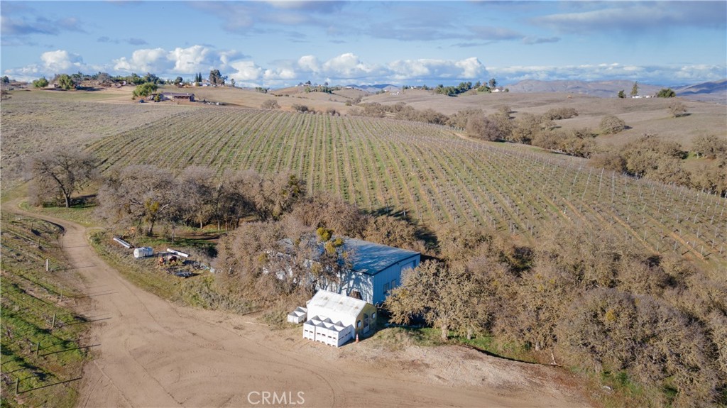 390 San Marcos Road Paso Robles, CA 93446 - Photo 54 of 62 a view of a dry yard with wooden fence