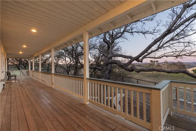 a dining table with chairs and wooden floor