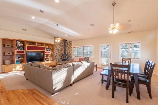 a bedroom with a bed and a table chair