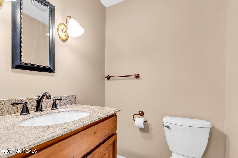 9 Scheiber Drive Brick, NJ 08723 - Photo 11 of 53 a bathroom with a granite countertop sink mirror and toilet