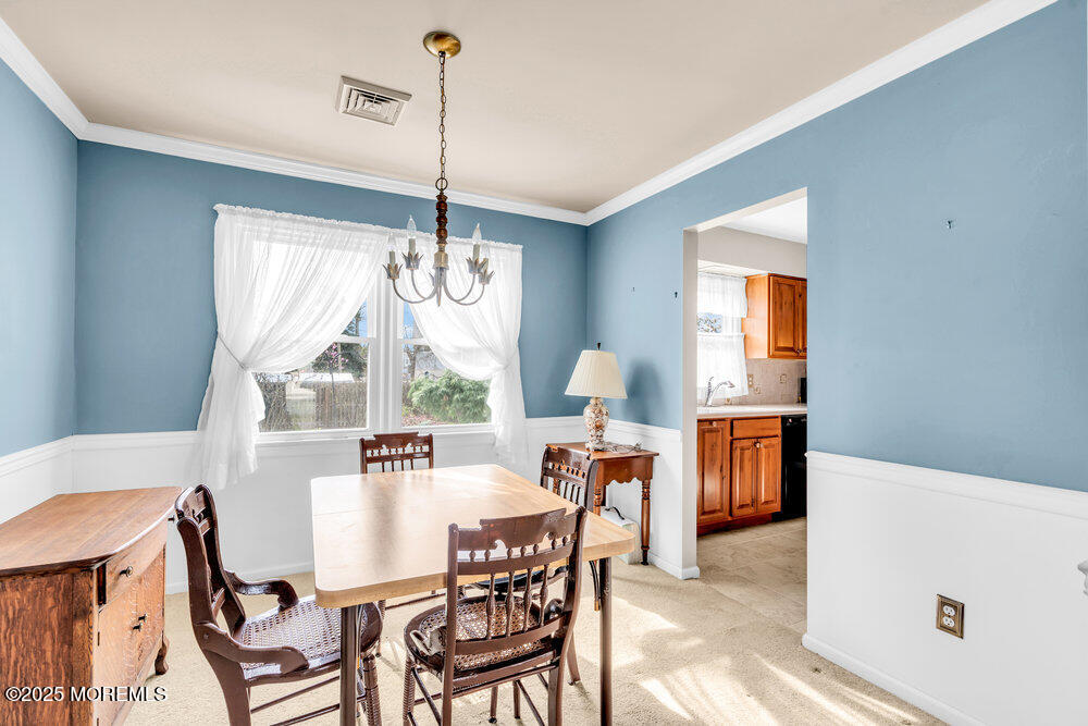 9 Scheiber Drive Brick, NJ 08723 - Photo 12 of 53 a view of a dining room with furniture window and outside view