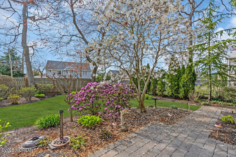 9 Scheiber Drive Brick, NJ 08723 - Photo 26 of 53 a front view of a house with garden
