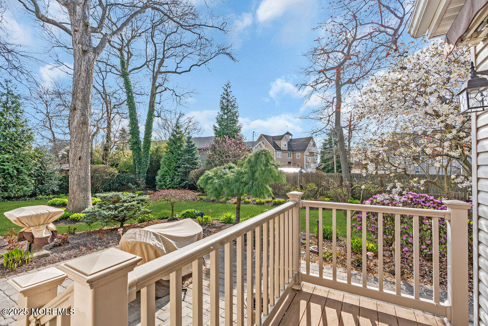 9 Scheiber Drive Brick, NJ 08723 - Photo 28 of 53 a view of a chair and tables in the backyard of the house