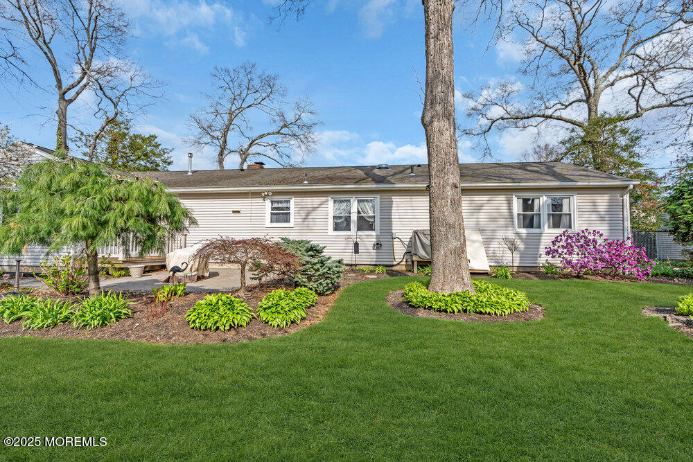 9 Scheiber Drive Brick, NJ 08723 - Photo 31 of 53 a front view of a house with garden