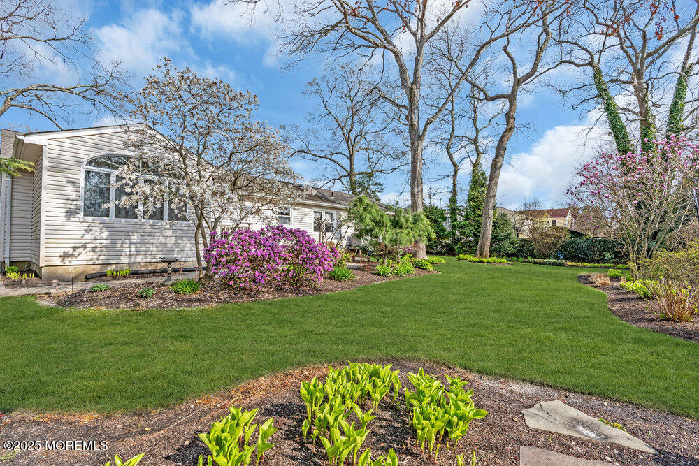 9 Scheiber Drive Brick, NJ 08723 - Photo 33 of 53 a front view of a house with garden