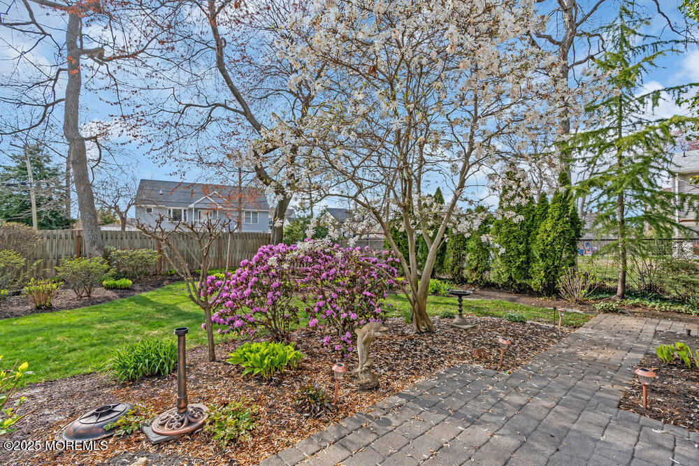 9 Scheiber Drive Brick, NJ 08723 - Photo 41 of 53 a front view of a house with a yard