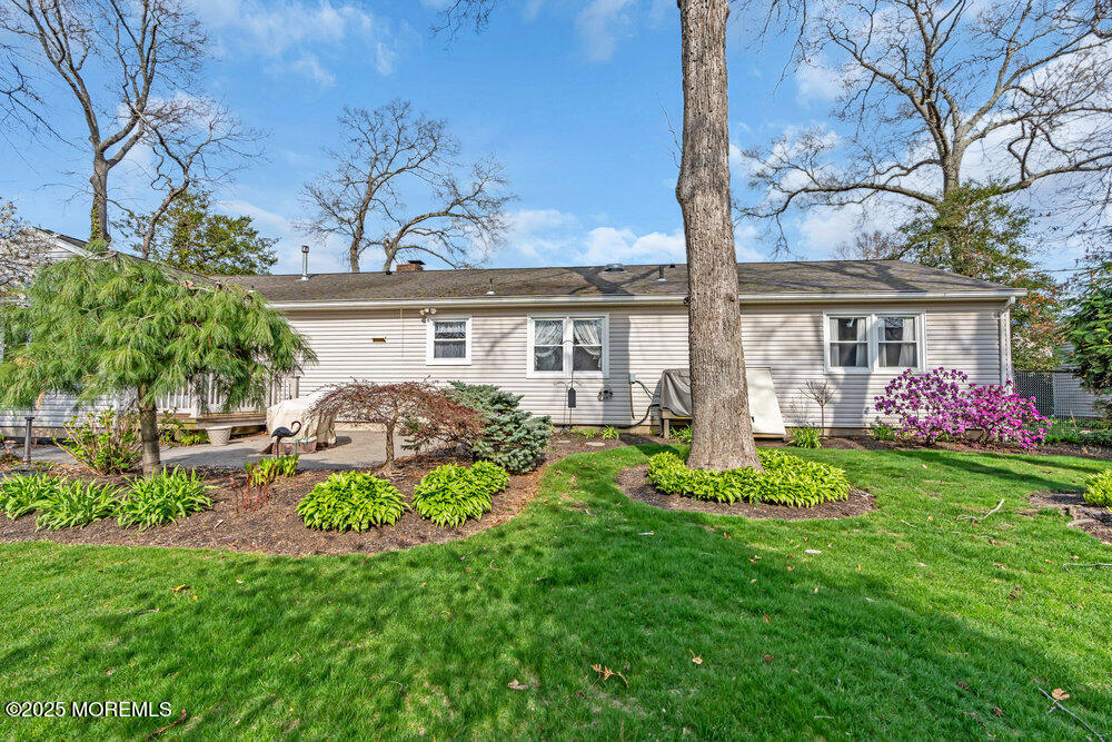 9 Scheiber Drive Brick, NJ 08723 - Photo 46 of 53 a front view of a house with garden