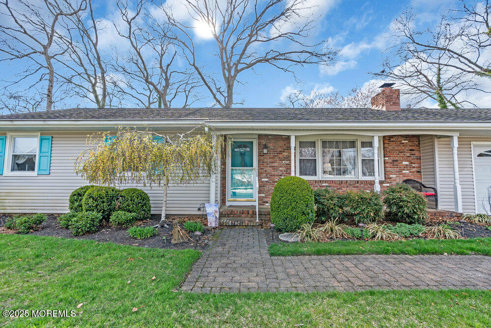 9 Scheiber Drive Brick, NJ 08723 - Photo 52 of 53 front view of a house with a yard