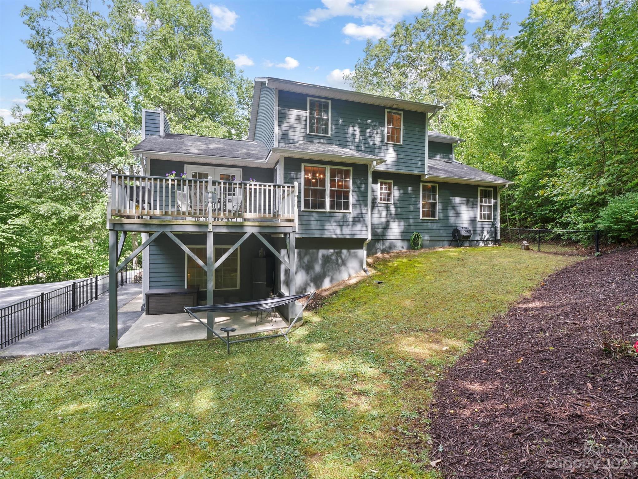 25 Falcon Crest Drive Fairview, NC 28730 - Photo 31 of 41 a view of a house with backyard