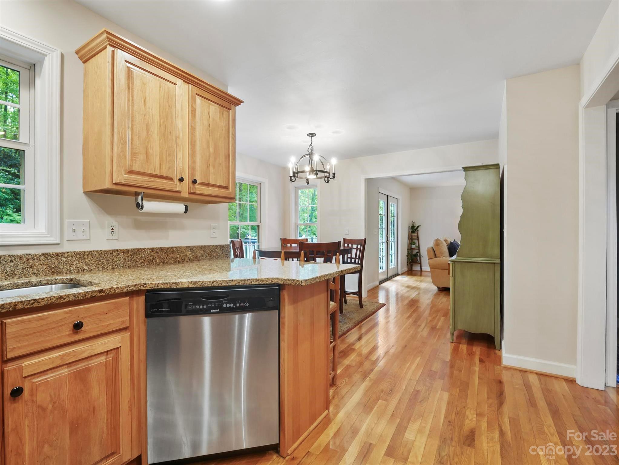 25 Falcon Crest Drive Fairview, NC 28730 - Photo 4 of 41 a kitchen with a sink and wooden floor