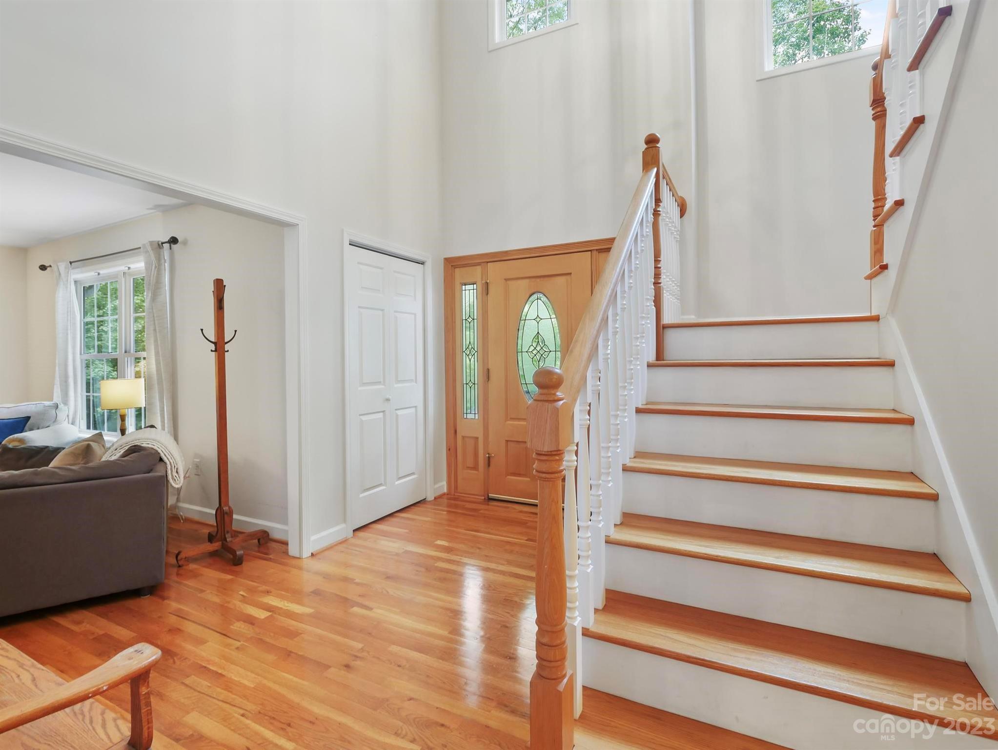 25 Falcon Crest Drive Fairview, NC 28730 - Photo 10 of 41 a view of entryway with wooden floor and stairs