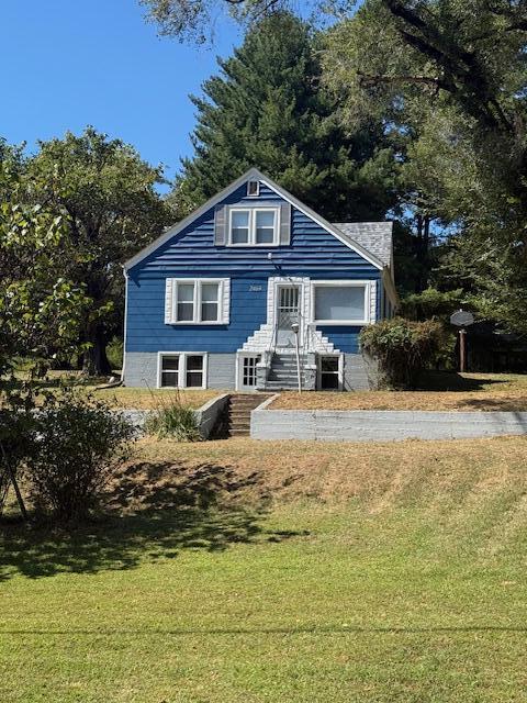 2469 Oak Level Road Bassett, VA 24055 - Photo 2 of 48 a front view of a house with a yard