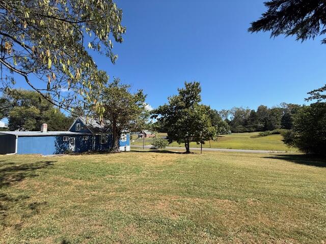 2469 Oak Level Road Bassett, VA 24055 - Photo 8 of 48 a view of swimming pool with an outdoor space and seating area