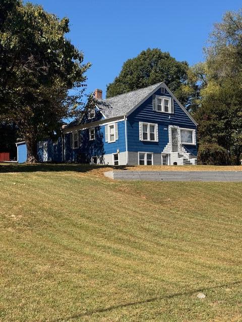 2469 Oak Level Road Bassett, VA 24055 - Photo 10 of 48 a front view of a house with a yard