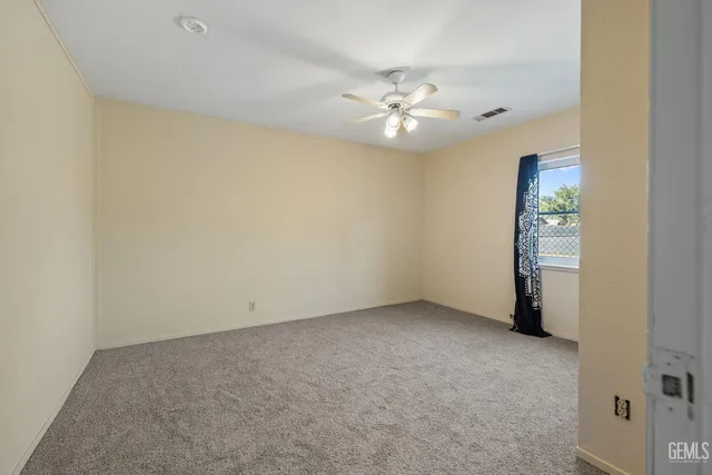 a bathroom with a shower and a sink