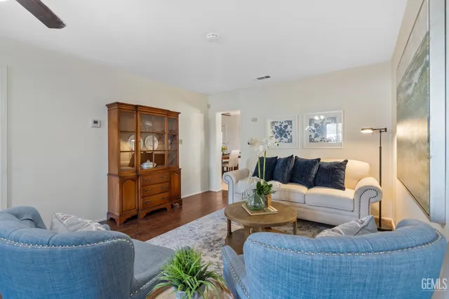 a kitchen with a sink appliances and cabinets