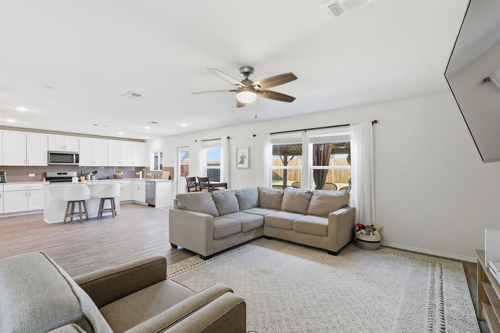 16041 Pious Drive Haslet, TX 76052 - Photo 8 of 36 Living area with light wood finished floors, a ceiling fan, and recessed lighting