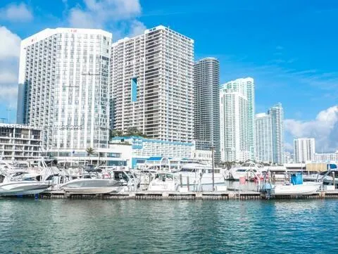 a view of a city with tall buildings