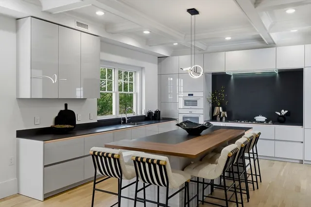 a kitchen with a sink and a window
