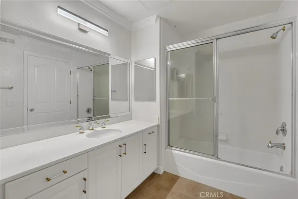 a bathroom with a sink toilet and vanity