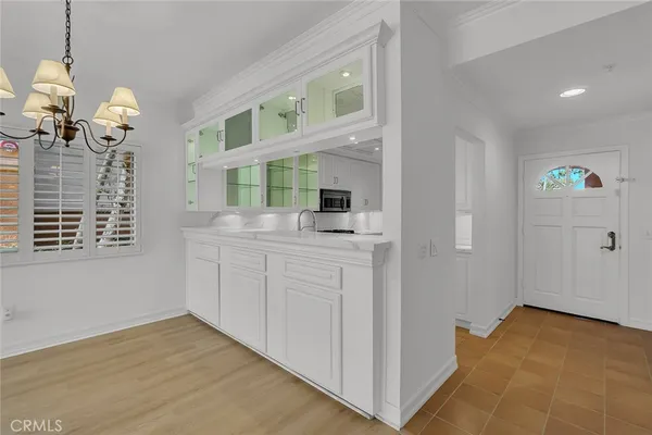 a bathroom with a sink a vanity and a mirror
