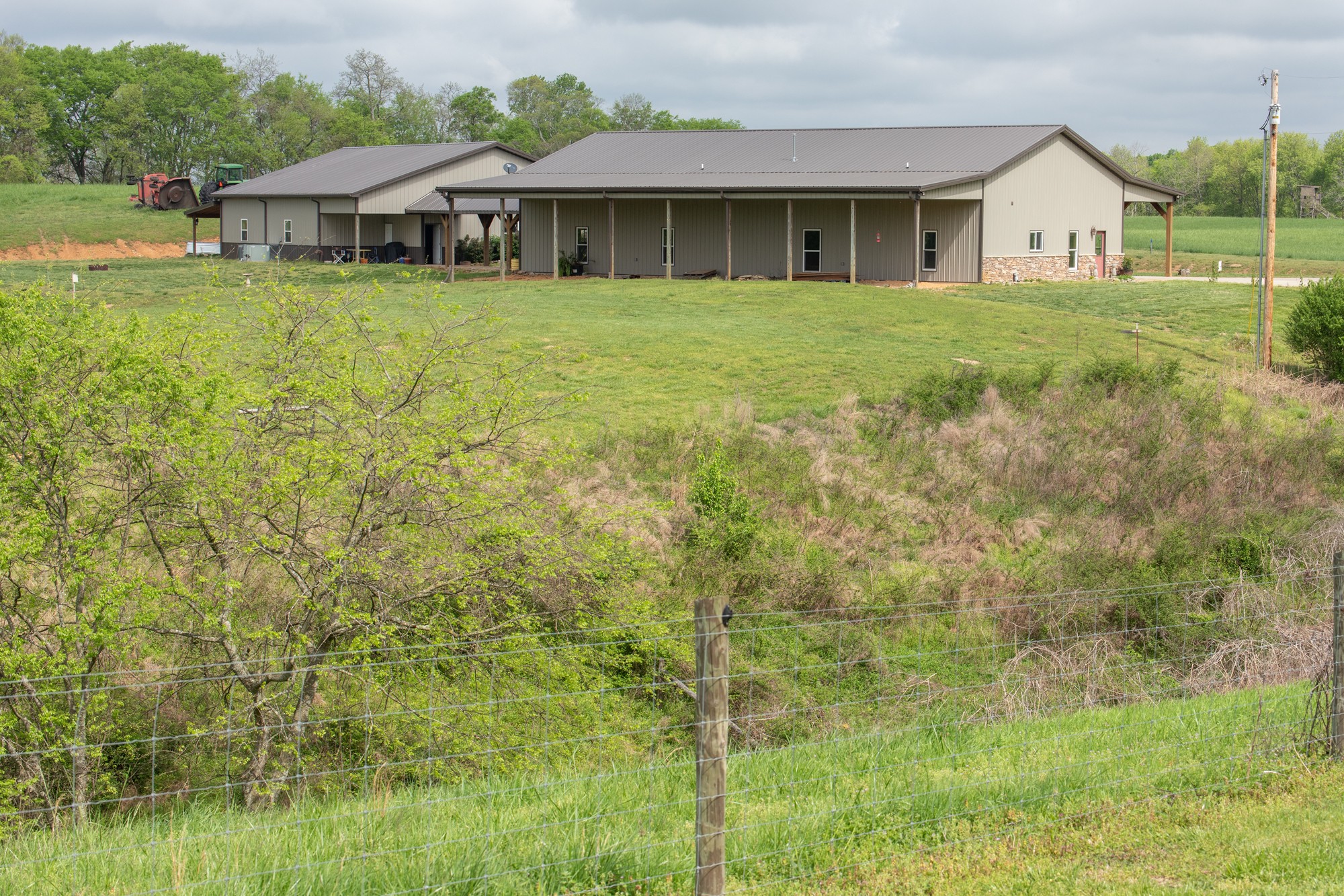 2348 Tom Fitzgerald Road Columbia, TN 38401 - Photo 1 of 47 a front view of a house with garden