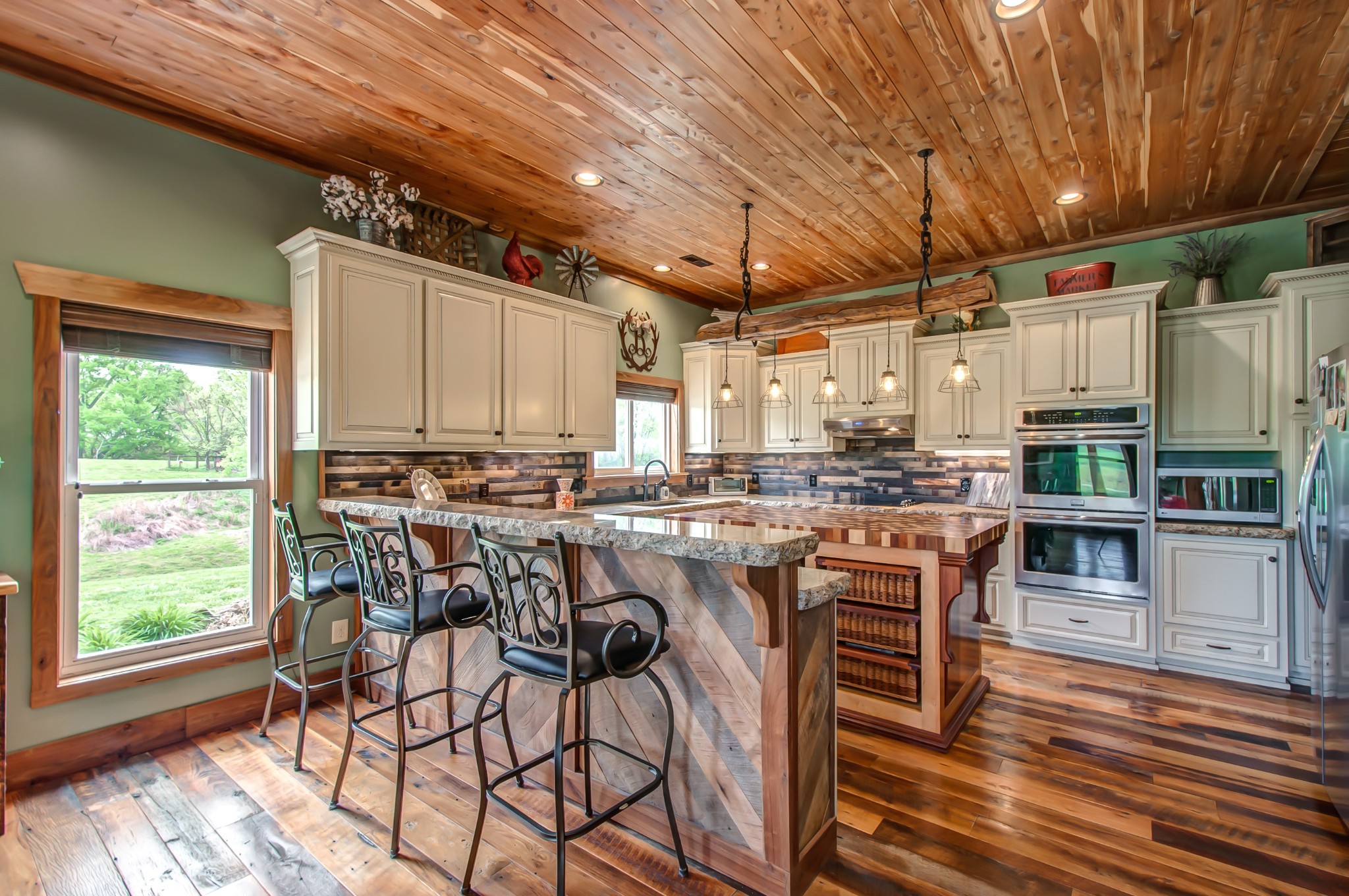 2348 Tom Fitzgerald Road Columbia, TN 38401 - Photo 18 of 47 a kitchen with a table chairs stove and cabinets