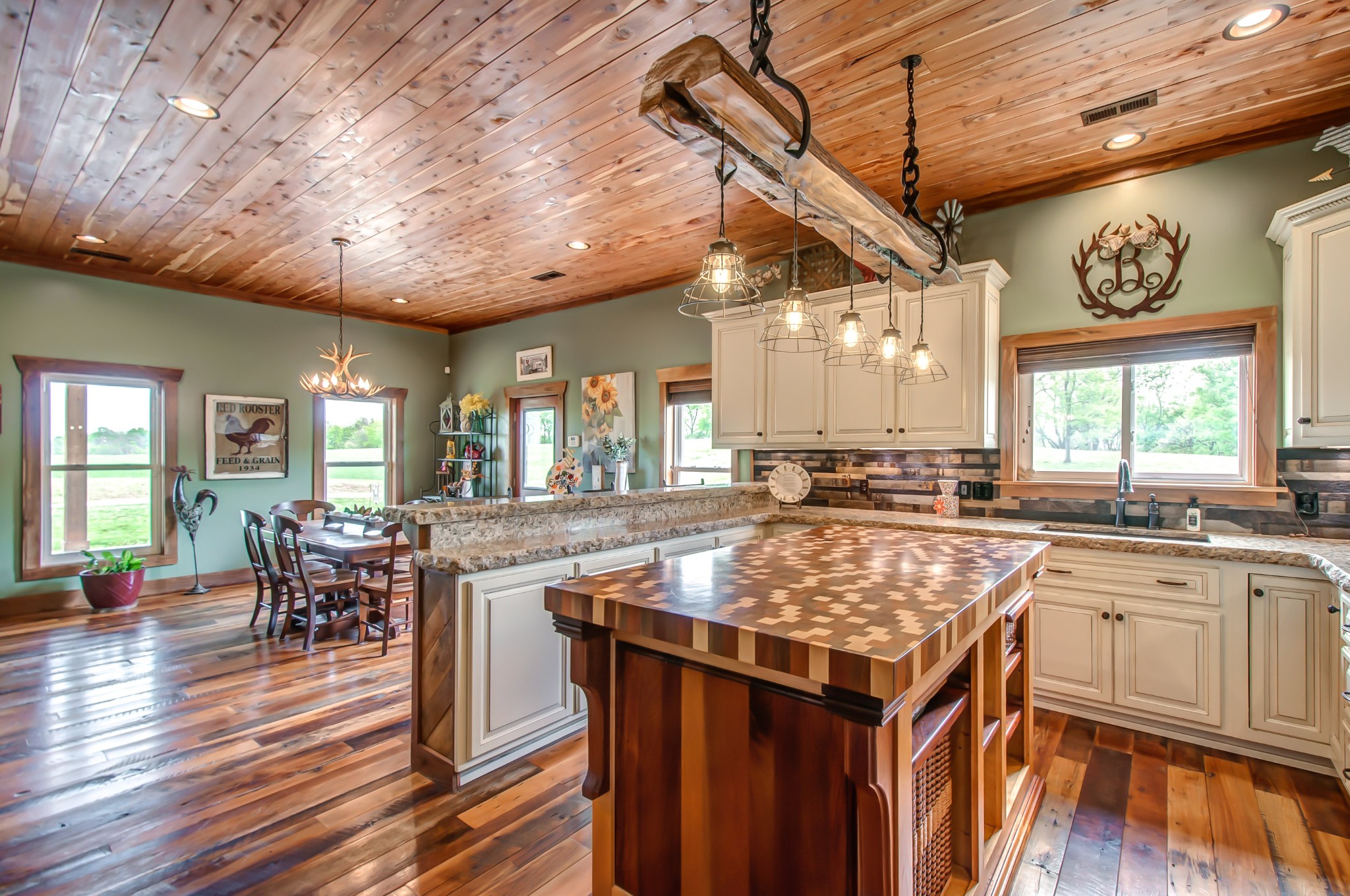 2348 Tom Fitzgerald Road Columbia, TN 38401 - Photo 19 of 47 a kitchen with a stove sink cabinets and wooden floor