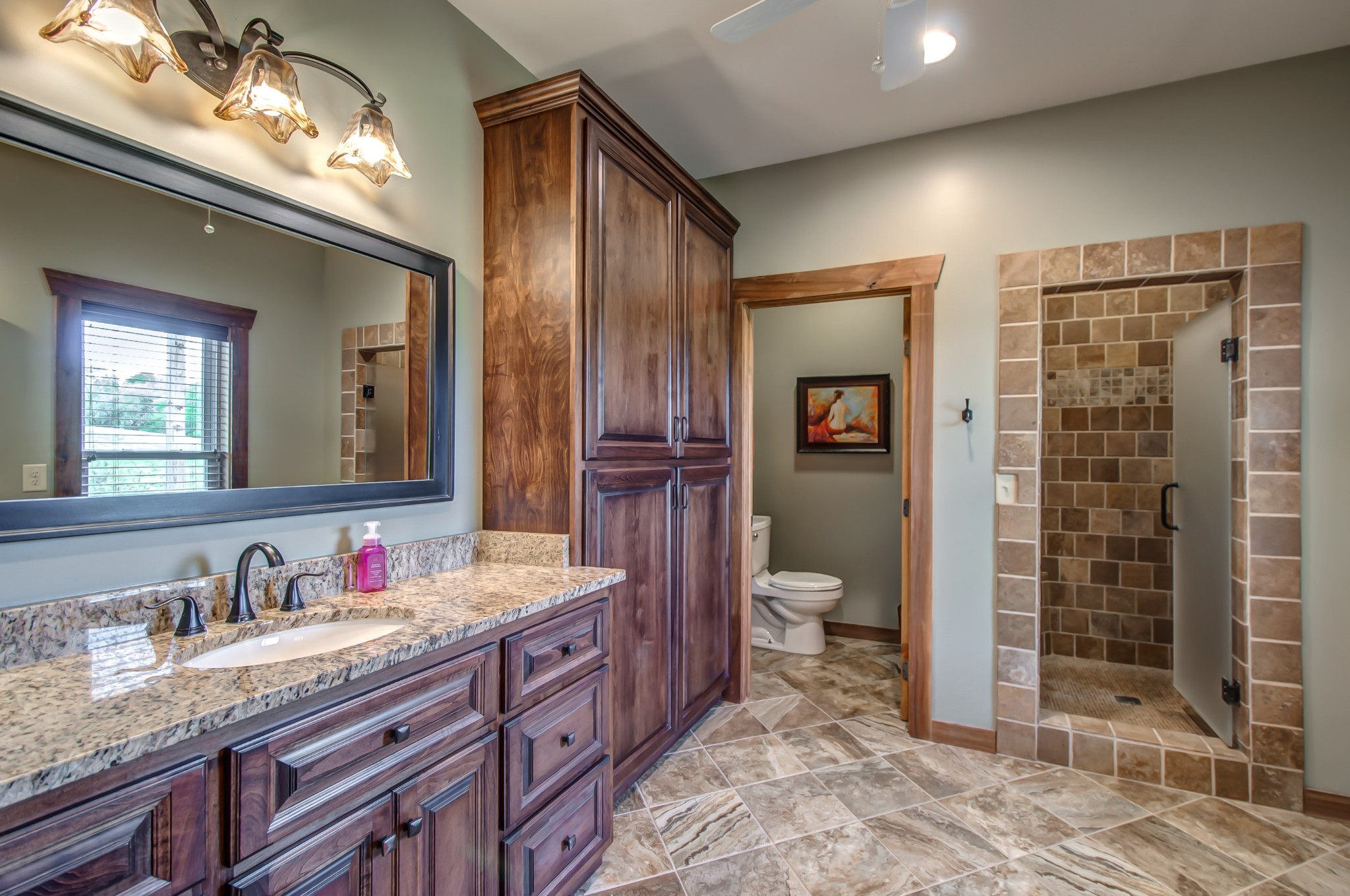 2348 Tom Fitzgerald Road Columbia, TN 38401 - Photo 21 of 47 a bathroom with a granite countertop sink toilet and shower